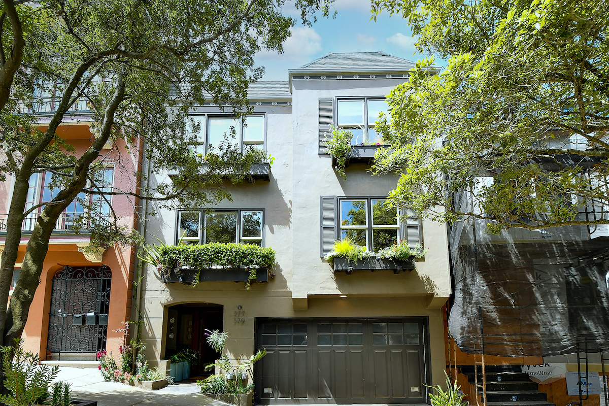 Renovated Two-Level Condominium with Decks and Shared Garden
