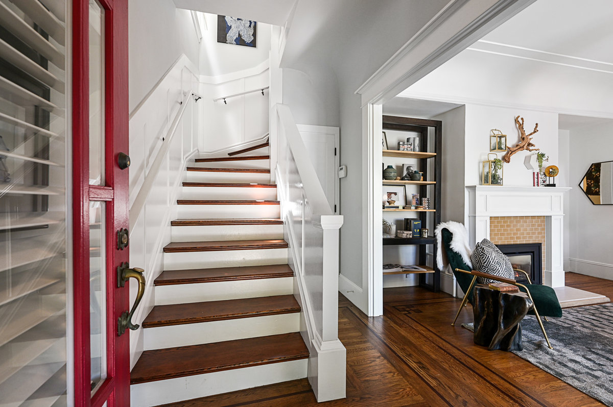 Front door with family room on right and stairs to main level