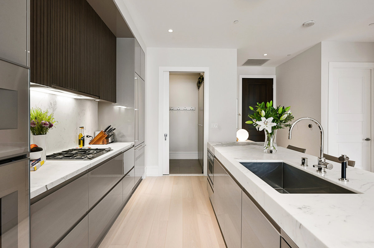Adjacent to the kitchen, the laundry/pantry offers superb storage.