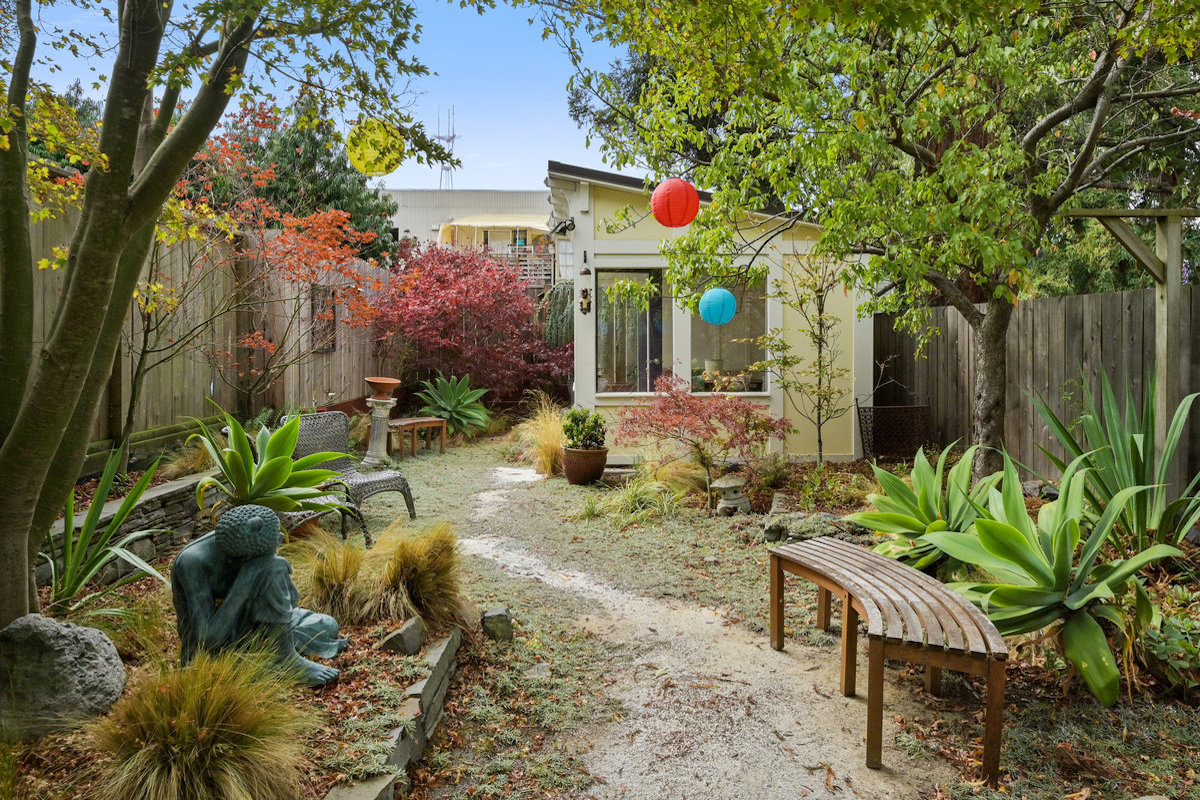 Common garden leading back to shared cottage