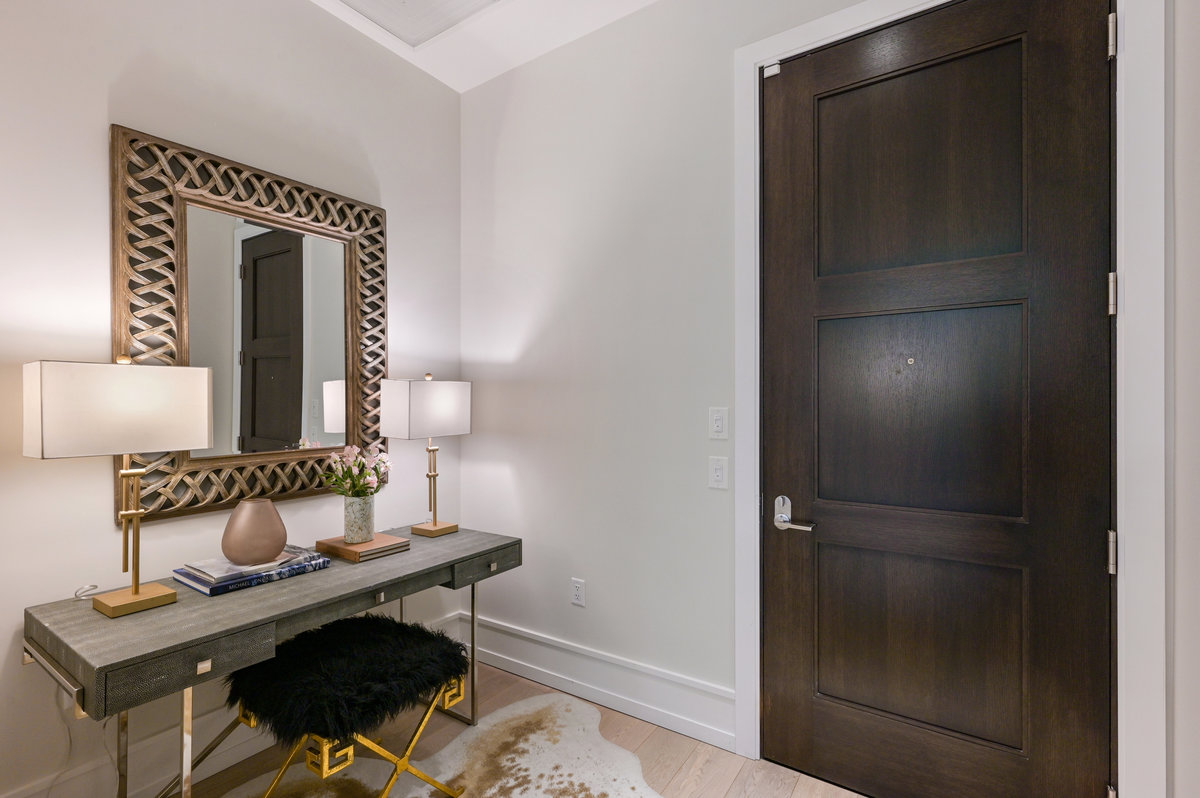 Entry foyer with plenty of room for desk, cabinet and favorite art