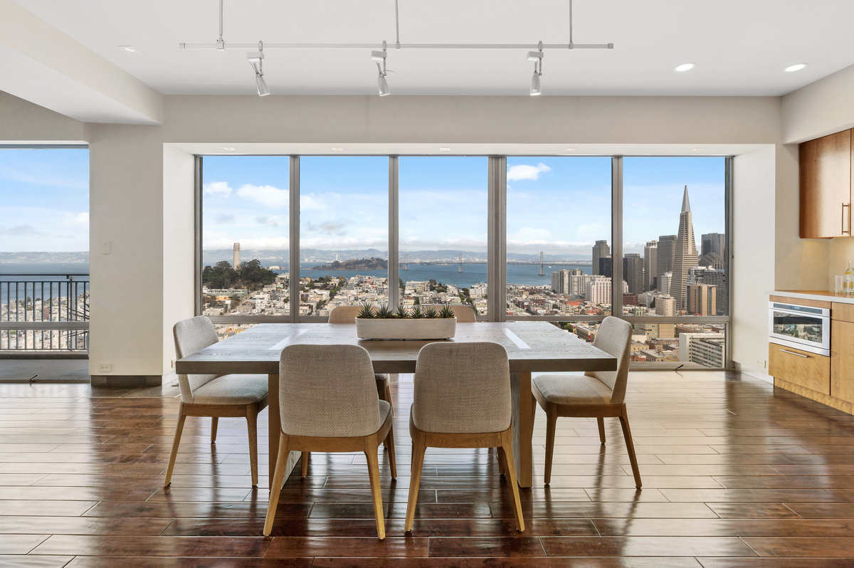 Outstanding eastern views of Coit Tower and Bay Bridge from dining area