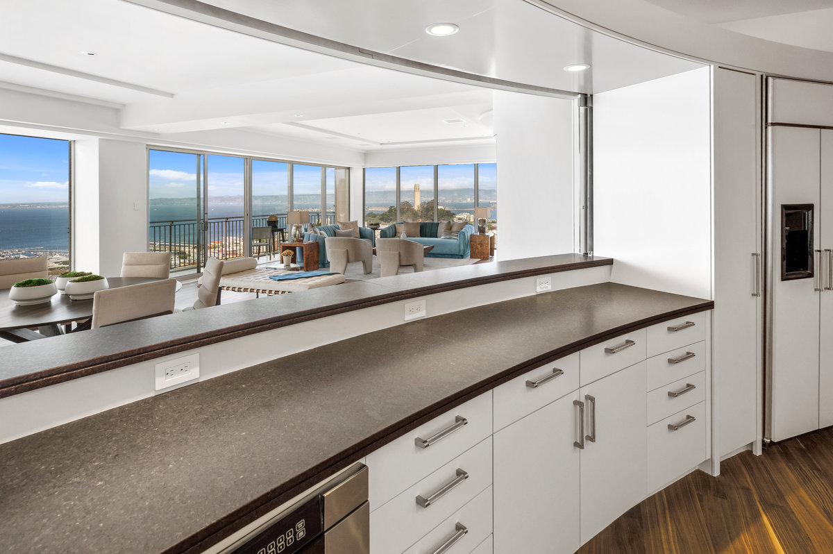 Feel connected to the views and great room from the exceptionally well-designed kitchen
