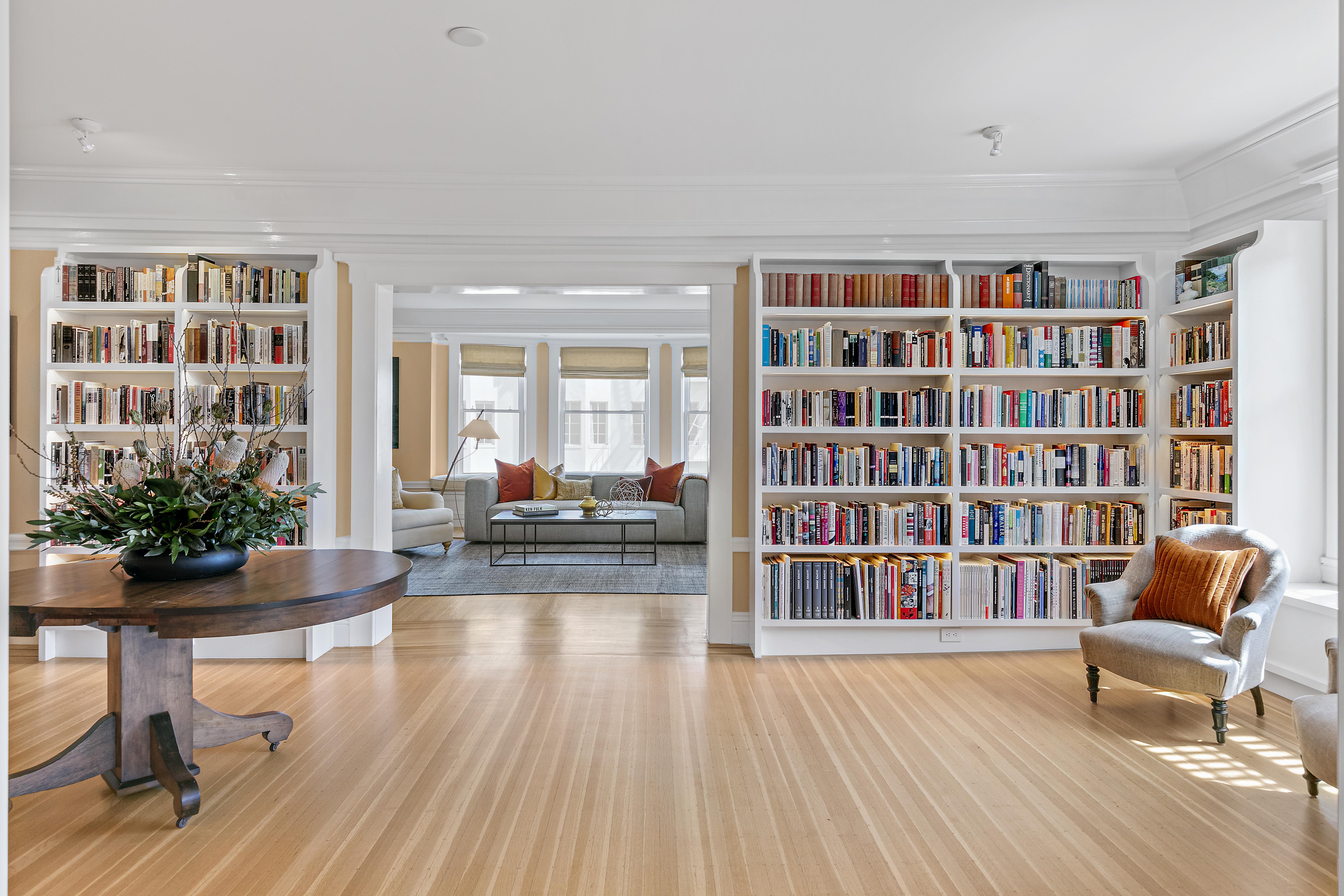 Apt. 41's entry foyer surrounded with library shelving