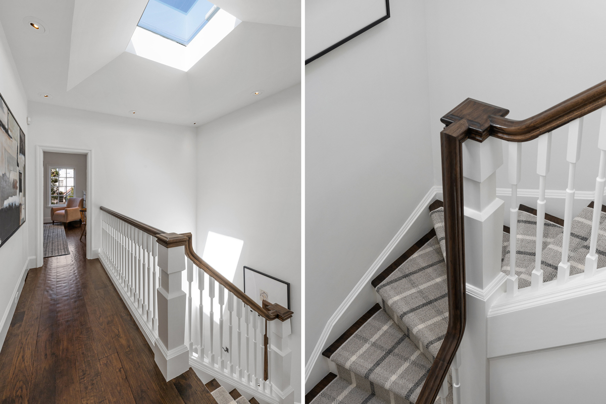 Handsome stair runner leading from main level to upper level; skylight above