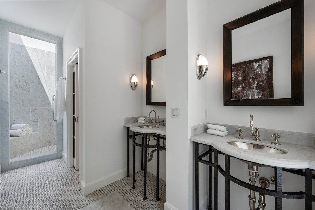 Primary bath with shower; doorway on right is WC