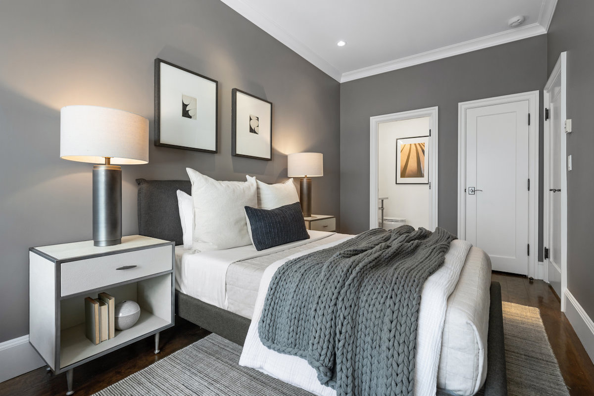 Middle bedroom is ensuite to its marble & tile bath