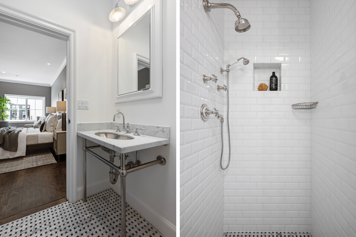 Marble & white tile shower in ensuite bath to middle bedroom