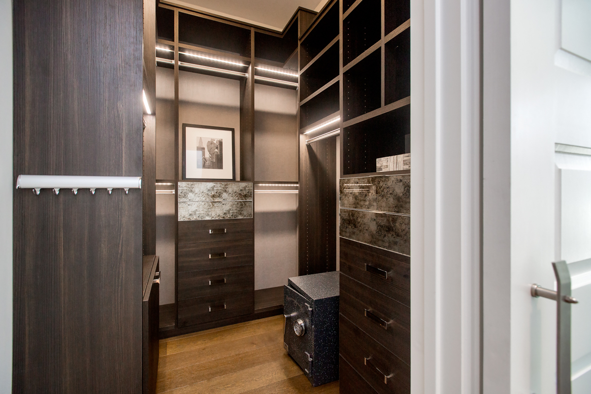 Bedroom suite with its generous walk-in, custom closet, safe included