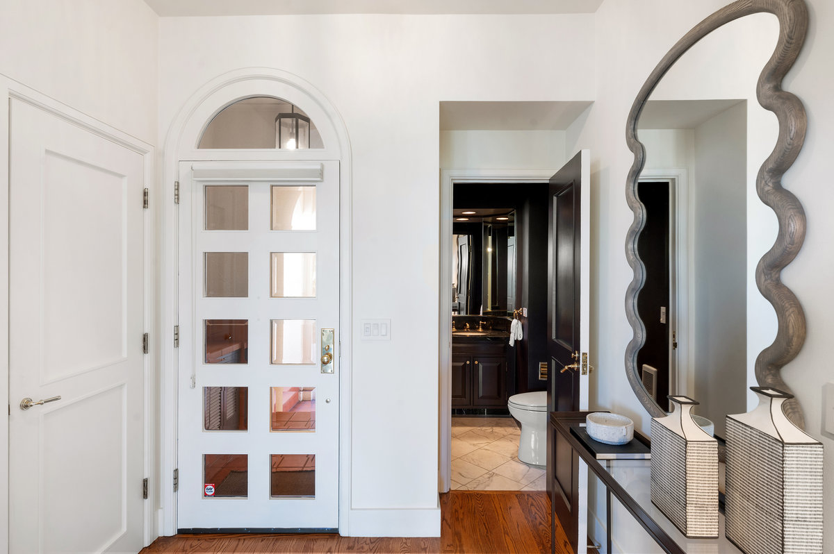 The powder room, tucked out of sight, completes the main level