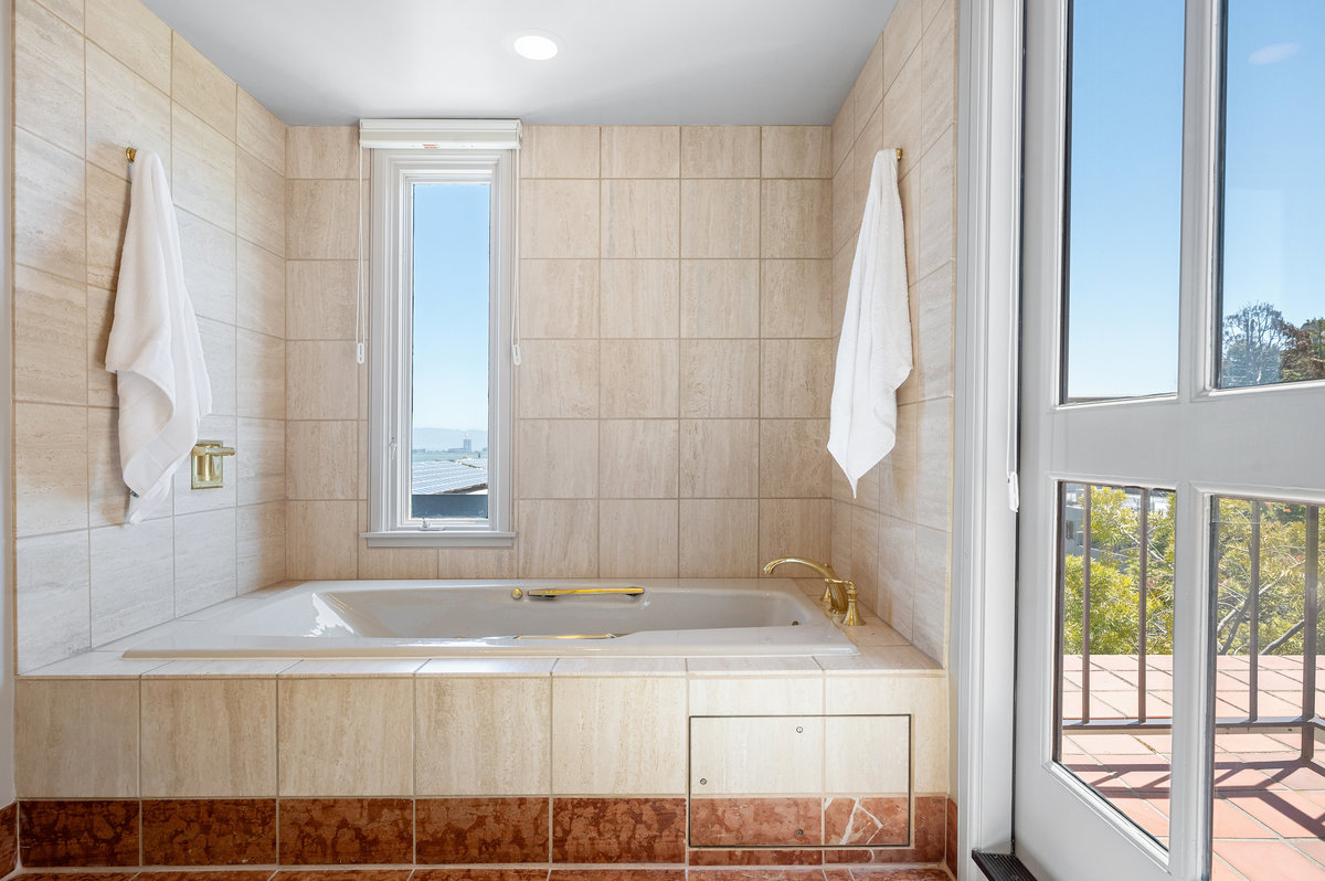 Ensuite bath with adjacent terrace