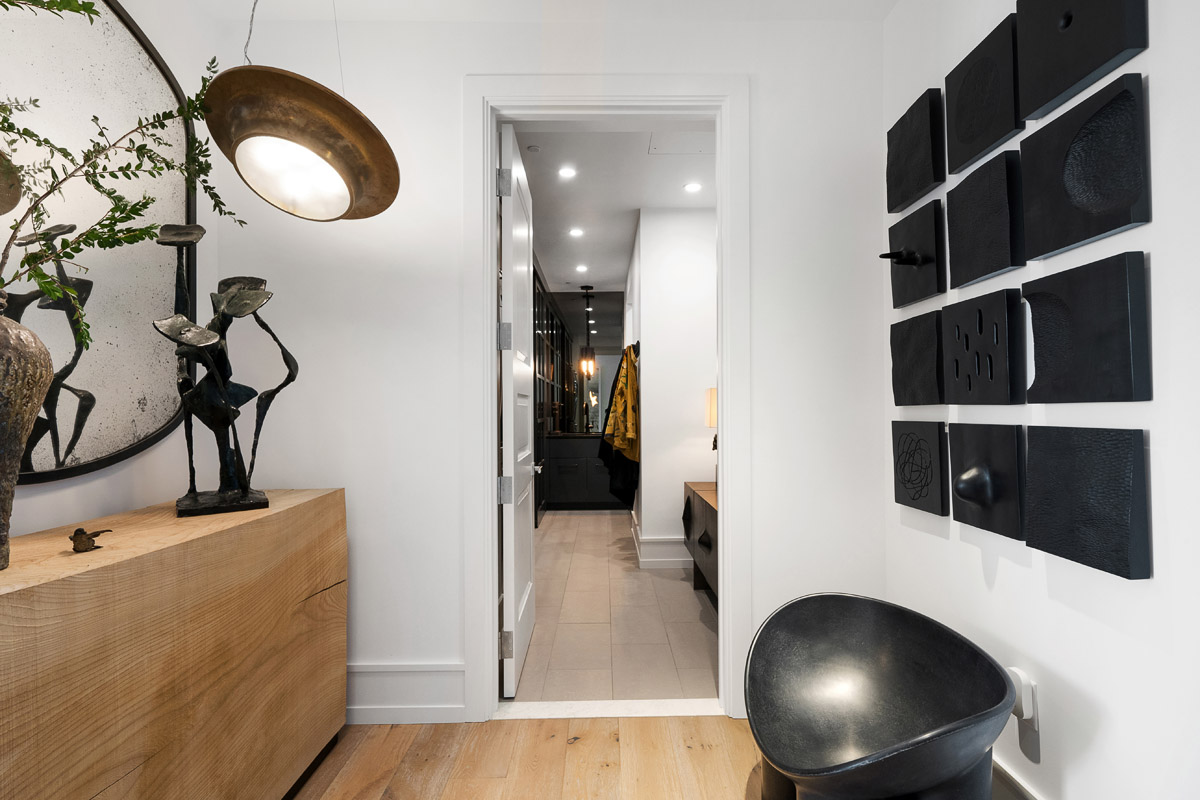 Entry foyer looking into laundry/pantry