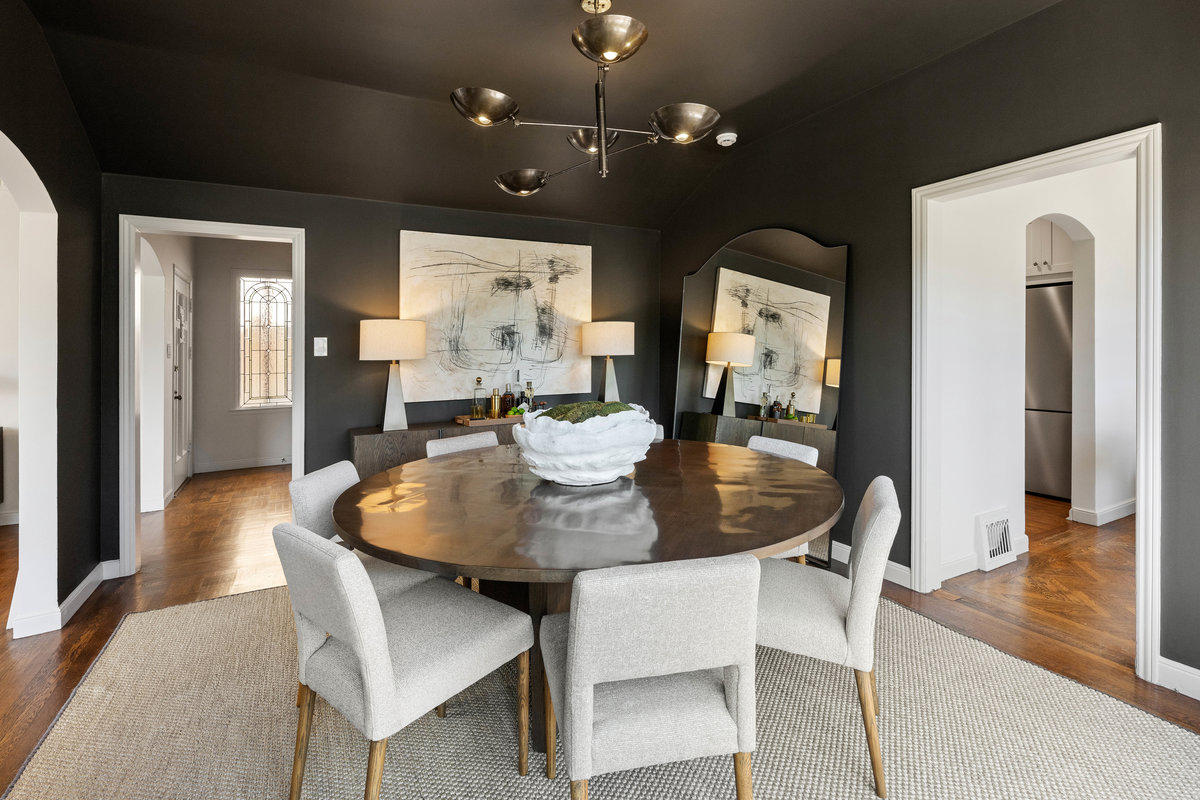 Dining room with doorway to foyer on left and to breakfast room & kitchen on right