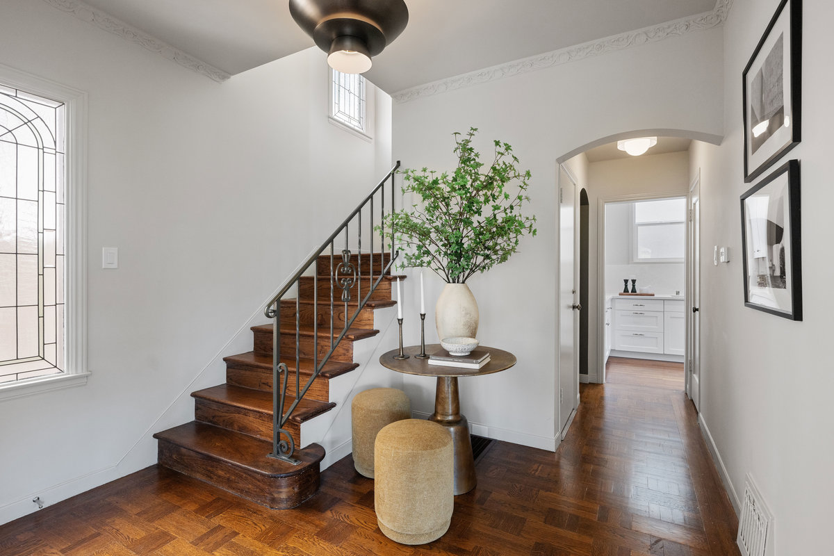 Stairs from main level foyer to upper level