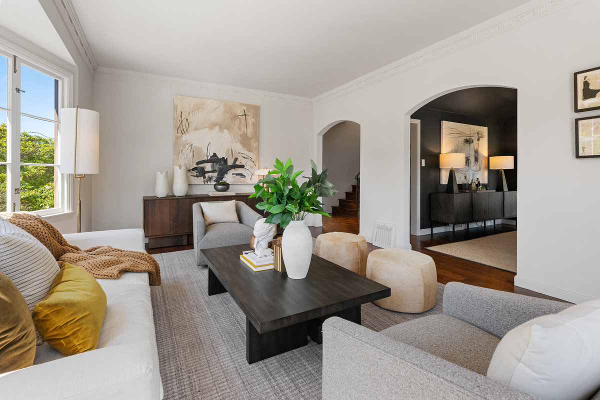 Living room with doorways to dining room and foyer