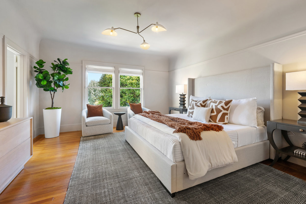 Generous primary bedroom with views of garden from east windows; fabulous morning light