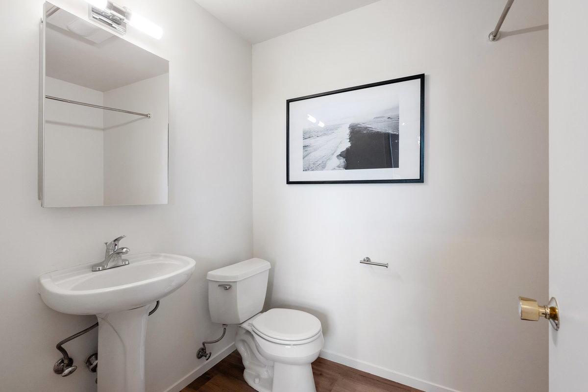 Flex room's half bath with extra space on right