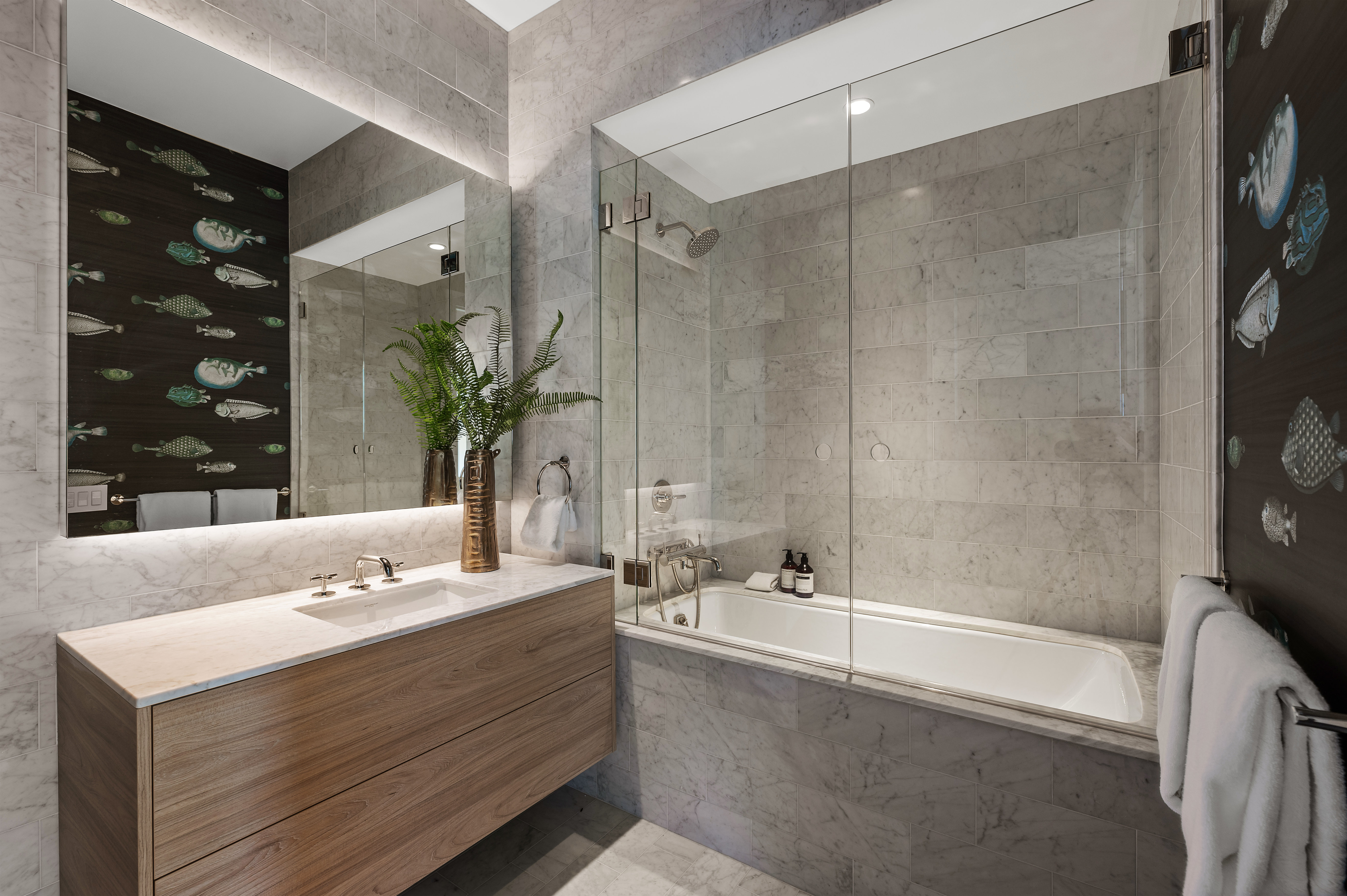 Guest bath. NOTE: wallpaper was removed by current owner.